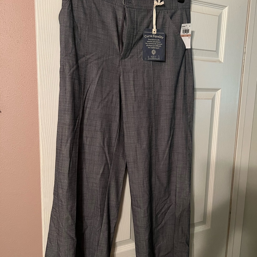 Democracy winner lines gray pants.